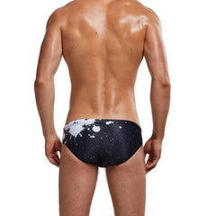 a sexy gay man in Men's Patterned Swim Briefs - pridevoyageshop.com - gay men’s underwear and swimwear
