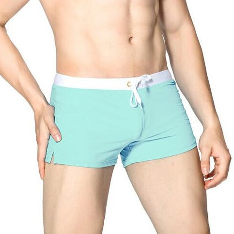 hot gay man in cyan Gay Swimwear & Beachwear | Men's Square Cut Swim Trunks- pridevoyageshop.com - gay men’s underwear and swimwear