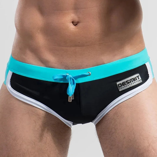 a hot gay man in black DESMIIT Retro Swim Briefs - pridevoyageshop.com - gay men’s underwear and swimwear