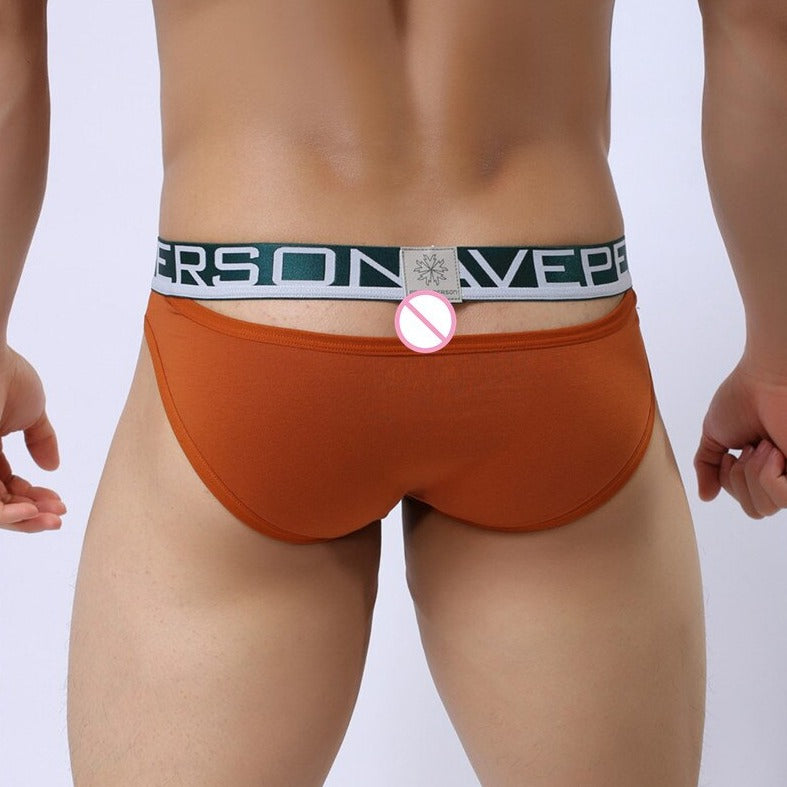 sexy gay man in orange Brave Person Peep That Ass Briefs | Gay Men Underwear- pridevoyageshop.com - gay men’s underwear and swimwear