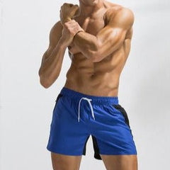 hot gay man in blue Gay Swimwear & Beachwear | Mens Two-Toned Board Shorts - pridevoyageshop.com - gay men’s underwear and swimwear