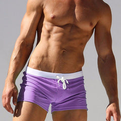 hot gay man in purple Gay Swimwear & Beachwear | Men's Square Cut Swim Trunks- pridevoyageshop.com - gay men’s underwear and swimwear