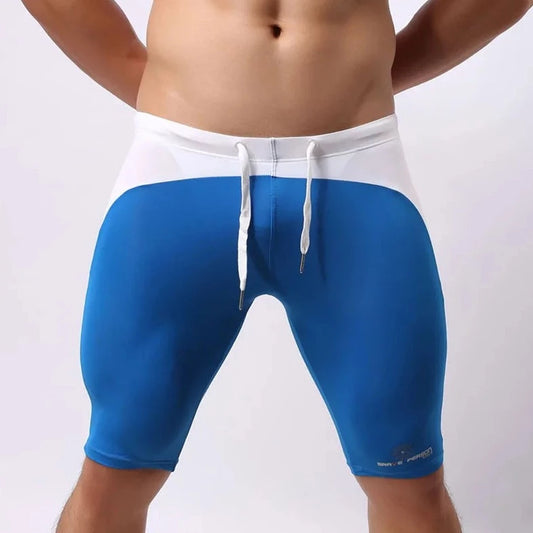 a hot gay man in sky blue Brave Person Two Toned Knee High Gym Shorts - pridevoyageshop.com - gay men’s underwear and swimwear
