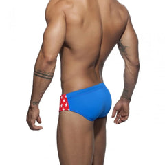 a hot gay man in red Men's Bowtie Stars Swim Briefs - pridevoyageshop.com - gay men’s underwear and swimwear
