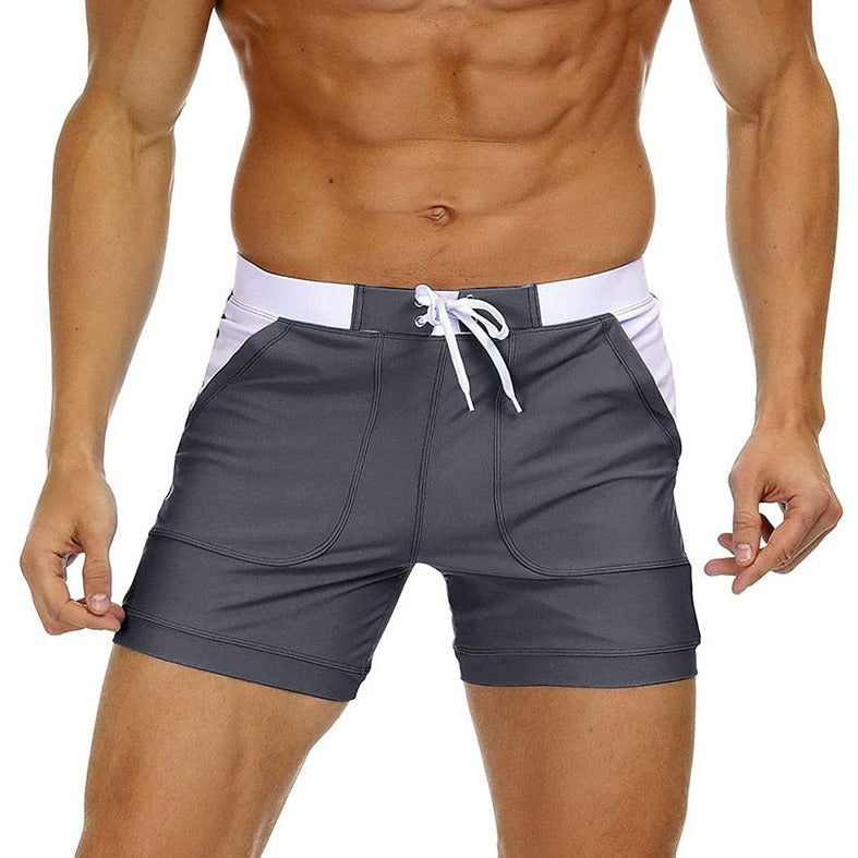 hot gay man in gray Gay Swimwear & Beachwear | Drawstring Boxer Swim Trunks - pridevoyageshop.com - gay men’s underwear and swimwear