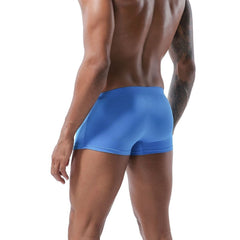 hot gay man in blue Gay Swimwear & Beachwear | Men's Bowtie Tight Swim Trunks - pridevoyageshop.com - gay men’s underwear and swimwear
