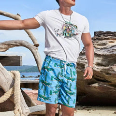 a handsome guy in blue Mexican Desert Croc Board Shorts - pridevoyageshop.com - gay men’s underwear and swimwear