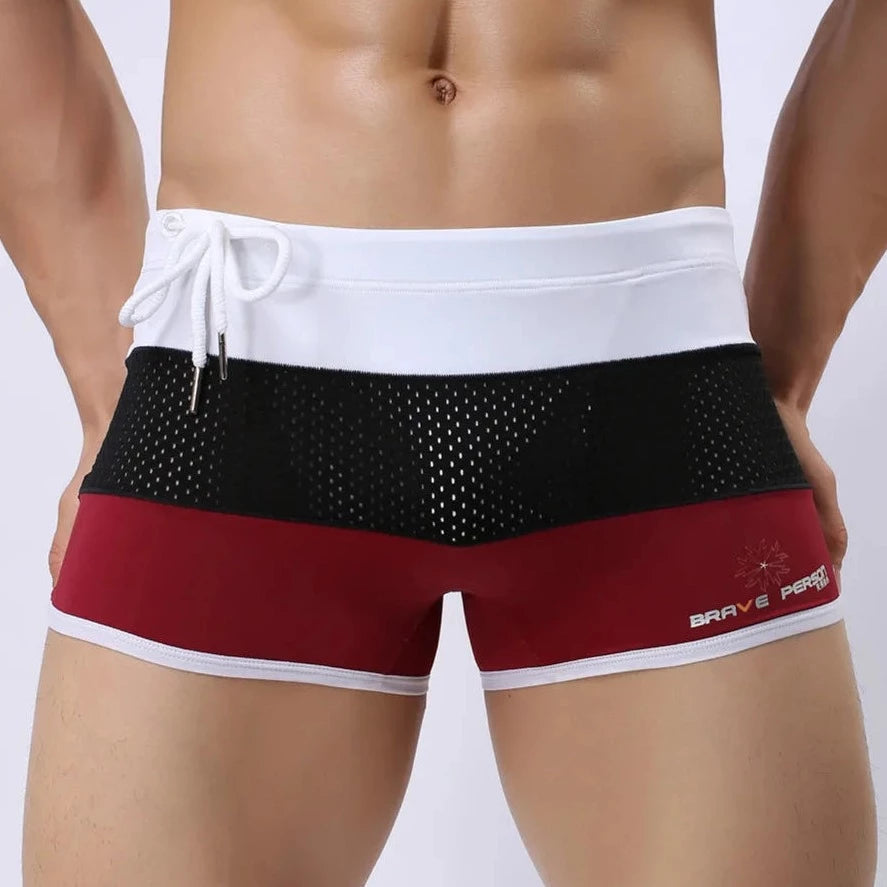a hot gay man in Red + Black + White Men's Tricolor Mesh Swim Trunks - pridevoyageshop.com - gay men’s underwear and swimwear