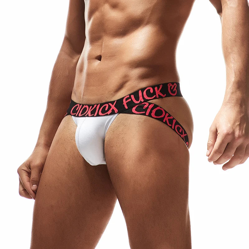 a hot gay man in white Rebel Jockstrap - pridevoyageshop.com - gay men’s underwear and swimwear