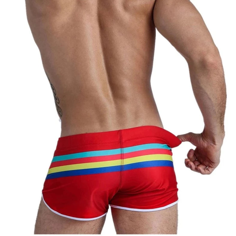 a hot gay man in red Men's Sunset Stripe Swim Trunks - pridevoyageshop.com - gay men’s underwear and swimwear