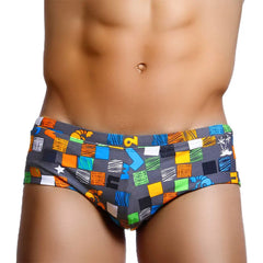 a hot gay man in Ocean Mosaic Swim Trunks - pridevoyageshop.com - gay men’s underwear and swimwear