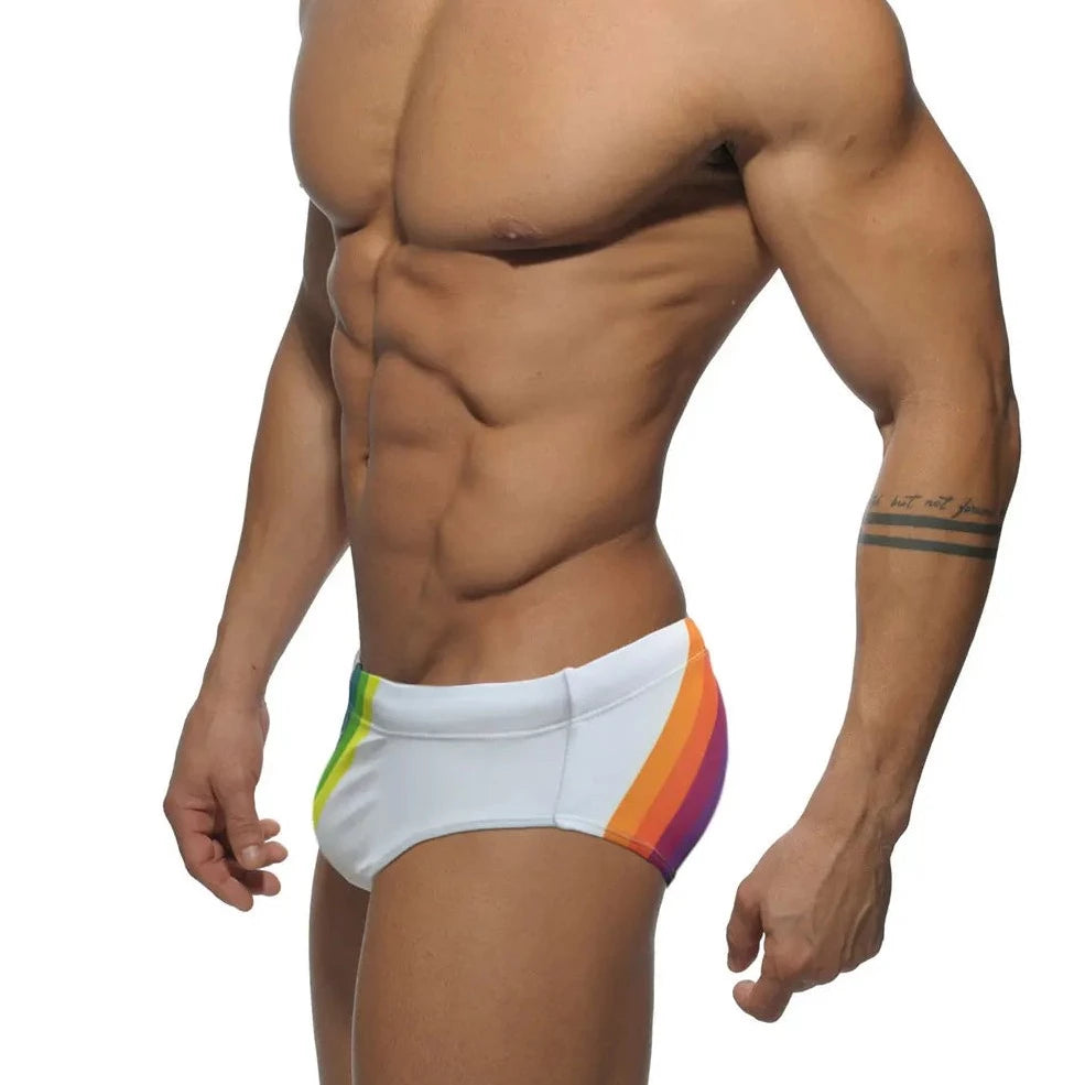 a hot gay man in white Men's Rainbow Surge Swim Briefs - pridevoyageshop.com - gay men’s underwear and swimwear