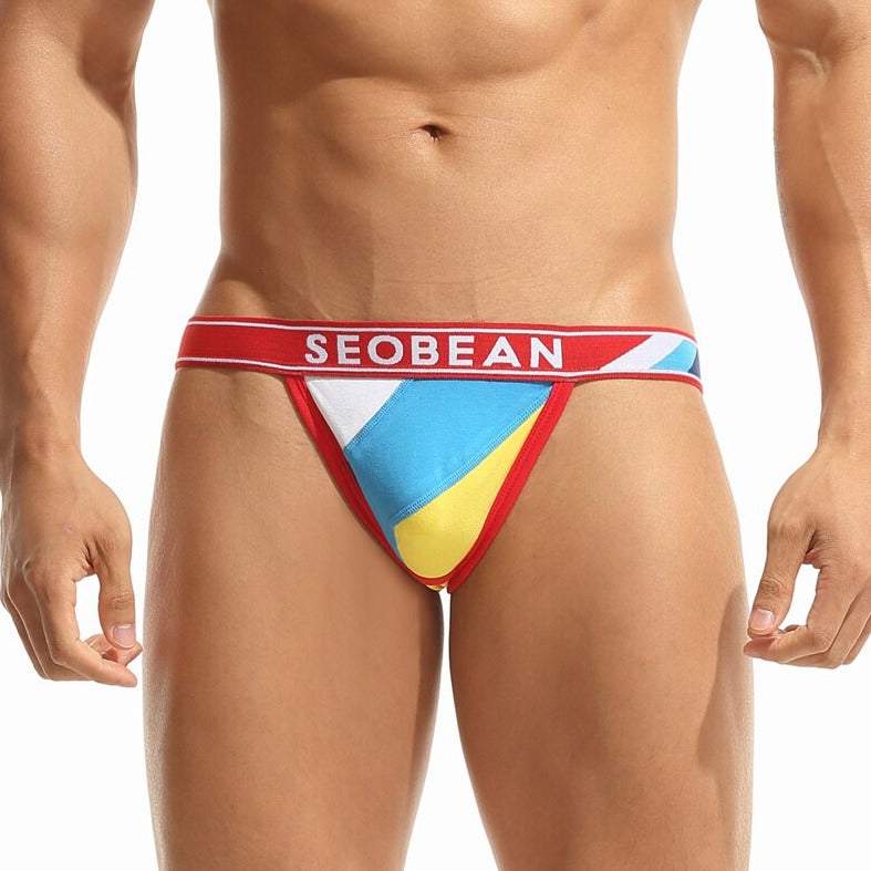 hot gay man in red Color Block Jockstrap: Best Jockstrap & Classic Jockstrap- pridevoyageshop.com - gay men’s underwear and swimwear