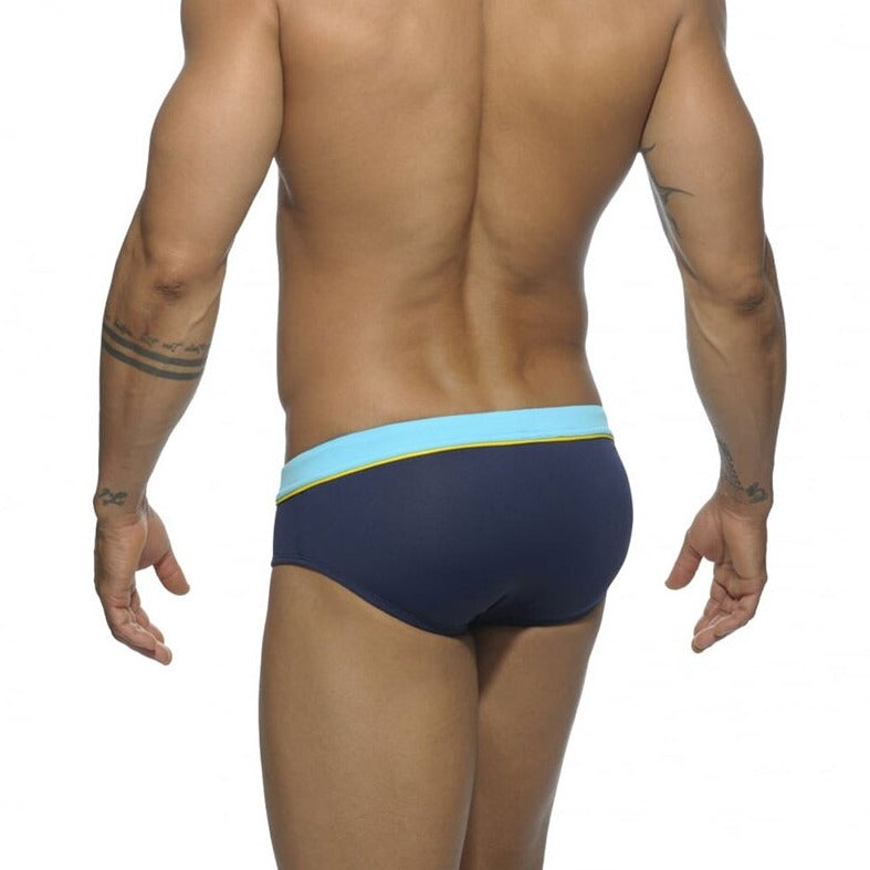 sexy gay man in blue Gay Swimwear | Side Stripe Swim Briefs- pridevoyageshop.com - gay men’s underwear and swimwear