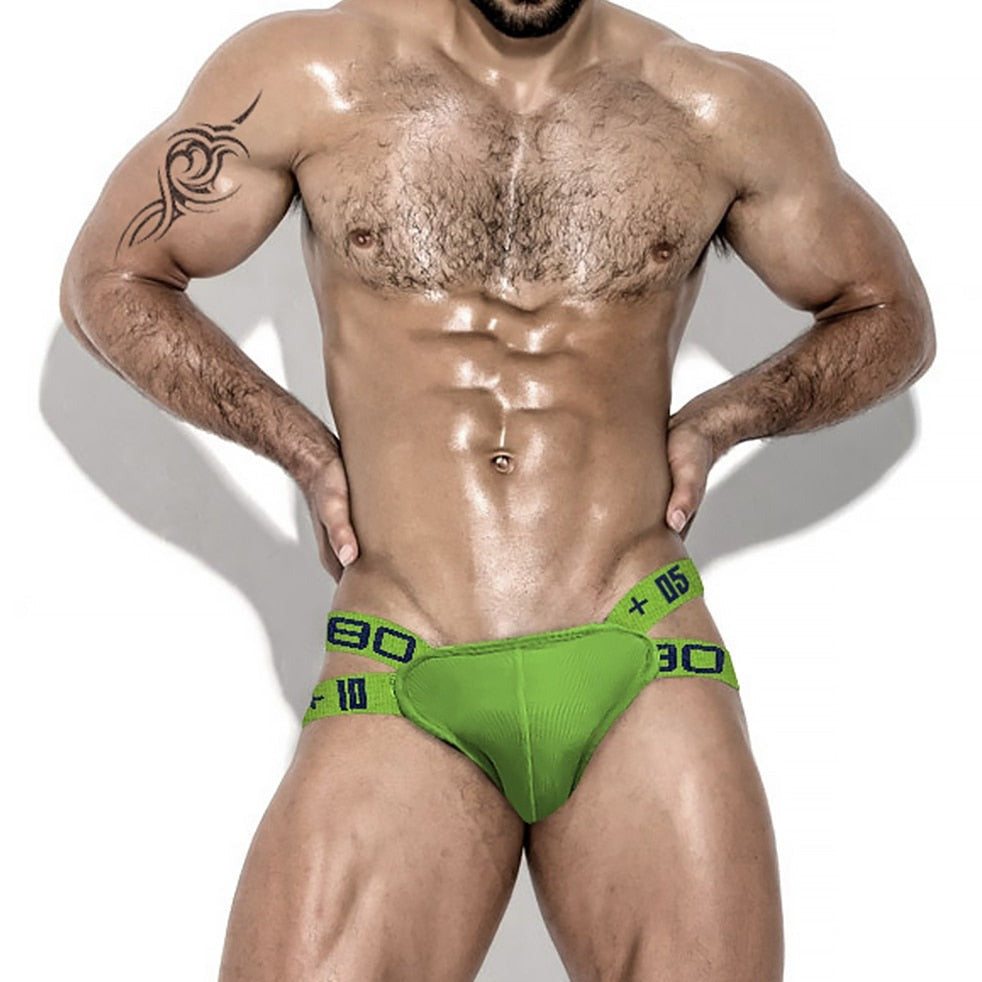 a man in Green OBSO Designer Jock Strap: Exotic Underwear for Men - pridevoyageshop.com - gay men’s underwear and swimwear