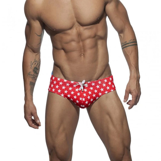 a hot gay man in red Men's Bowtie Stars Swim Briefs - pridevoyageshop.com - gay men’s underwear and swimwear