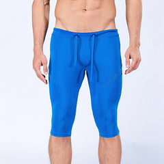 sexy gay man in blue Gay Leggings | Men's Sexy 3/4 Compression Sport Leggings - pridevoyageshop.com - gay men’s underwear and activewear