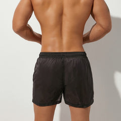 sexy gay man in black Gay Beachwear | Men's Transparent Board Shorts with Pockets - pridevoyageshop.com - gay men’s underwear and swimwear