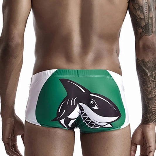 a hot gay man in green Shark Surfing Swim Trunks - pridevoyageshop.com - gay men’s underwear and swimwear