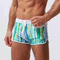 sexy gay man in green Gay Swimwear | Men' s Striped Swim Trunks With Zipper Pocket - pridevoyageshop.com - gay men’s underwear and swimwear