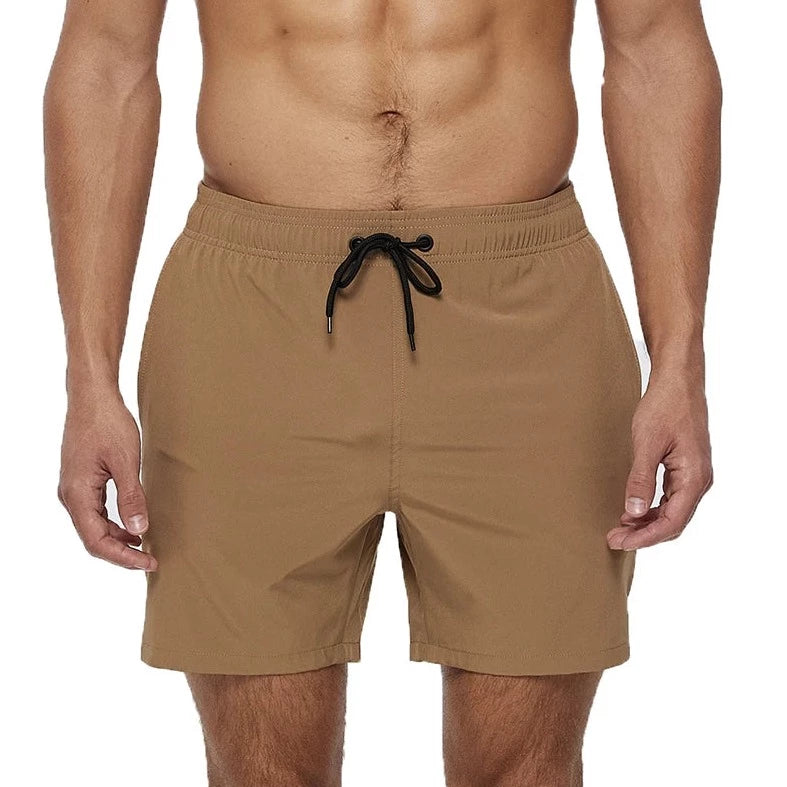 a hot gay man in khaki Solid Color Pocketed Board Shorts - pridevoyageshop.com - gay men’s underwear and swimwear