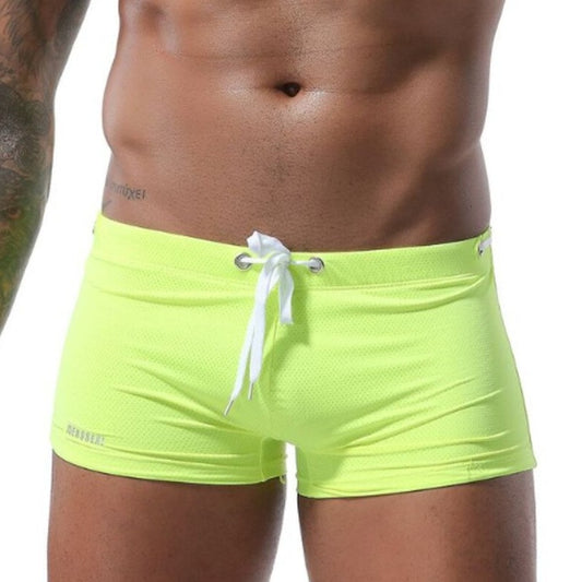 hot gay man in Fluorescence green Gay Swimwear & Beachwear | Men's Bowtie Tight Swim Trunks - pridevoyageshop.com - gay men’s underwear and swimwear