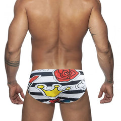 a hot gay man in Rose and Lips Swim Briefs - pridevoyageshop.com - gay men’s underwear and swimwear