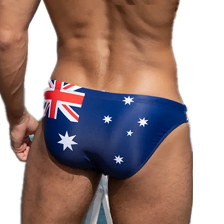 a hot gay man in Australia National Flags Skinny Swim Briefs - pridevoyageshop.com - gay men’s underwear and swimwear