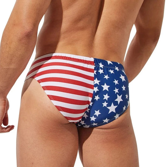 a sexy gay man in Men's Patriotic American Flag Swim Briefs - pridevoyageshop.com - gay men’s underwear and swimwear