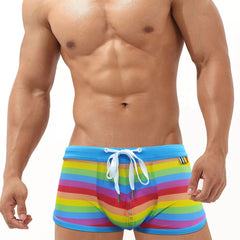 hot gay man in Gay Swimwear | Gay Men's Rainbow Drawstring Swim Trunks - pridevoyageshop.com - gay men’s underwear and swimwear