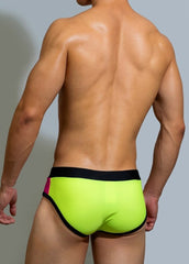 sexy gay man in rose red Gay Swimwear | DM Laced Swim Briefs- pridevoyageshop.com - gay men’s underwear and swimwear