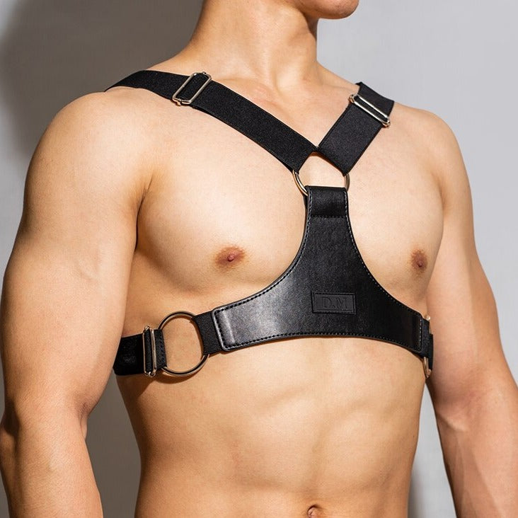 sexy gay man in Black Faux Leather Fetish Harness | Gay Harness- pridevoyageshop.com - gay men’s harness, lingerie and fetish wear