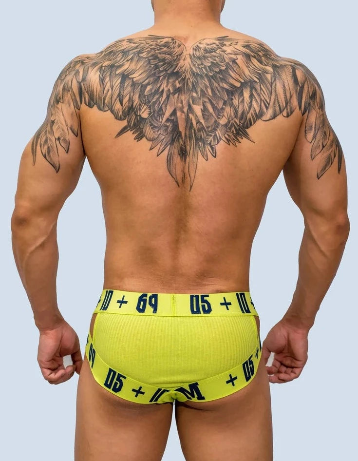 a hot gay man in yellow DM Sideshow Gay Briefs - pridevoyageshop.com - gay men’s underwear and swimwear