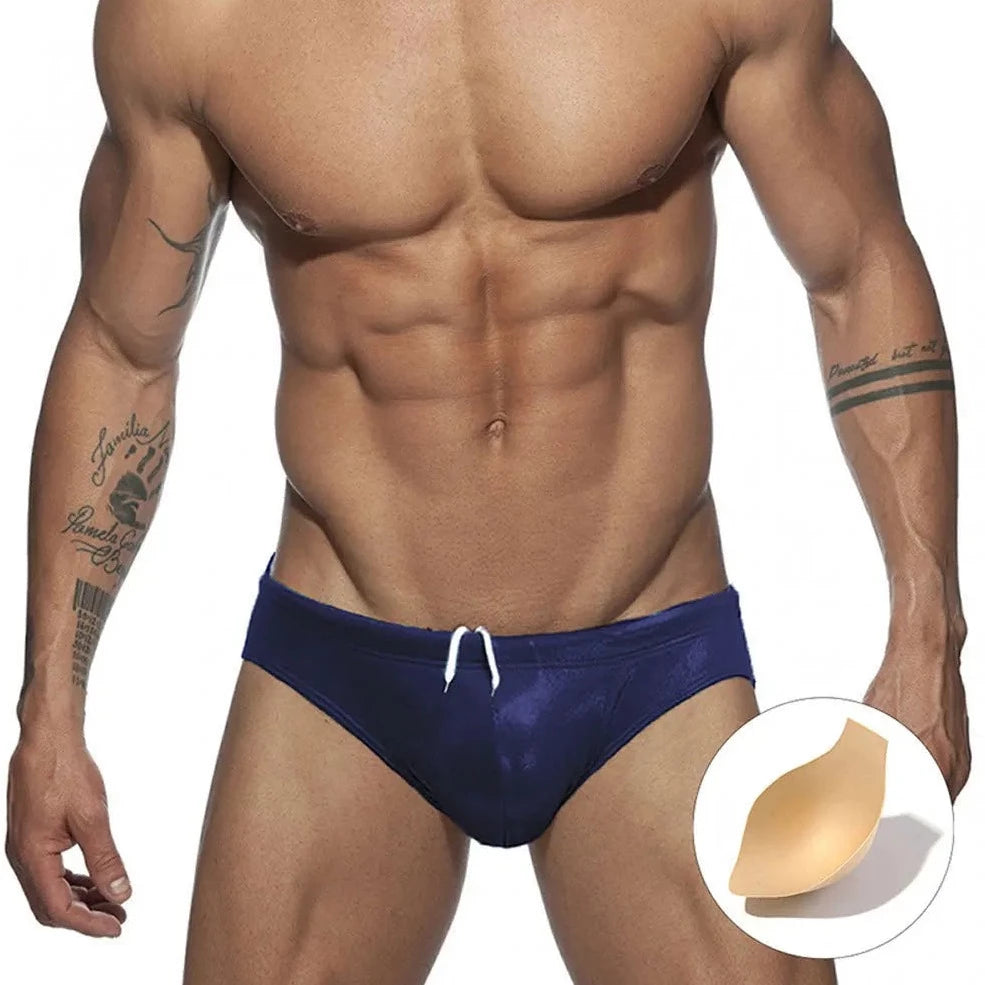 a hot gay man in royal blue Glide Metallic Swim Briefs - pridevoyageshop.com - gay men’s underwear and swimwear