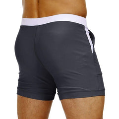 hot gay man in gray Gay Swimwear & Beachwear | Drawstring Boxer Swim Trunks - pridevoyageshop.com - gay men’s underwear and swimwear