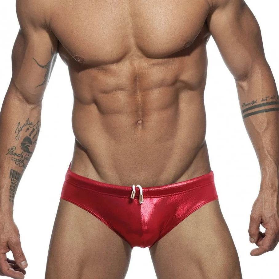 a hot gay man in red Glide Metallic Swim Briefs - pridevoyageshop.com - gay men’s underwear and swimwear