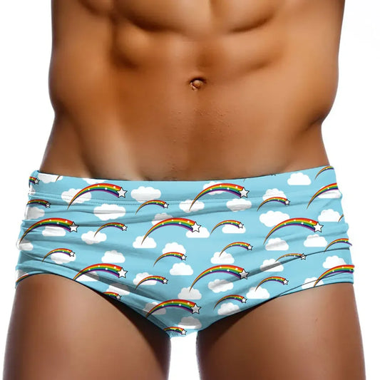 a hot gay man in Rainbow Stars Swim Trunks - pridevoyageshop.com - gay men’s underwear and swimwear