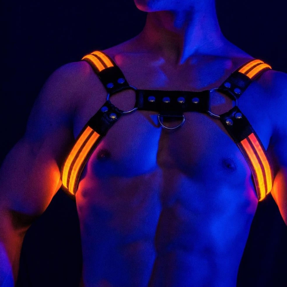 Orange Glow Chest Harness: Mens Best Night Club Wear- pridevoyageshop.com - gay men’s harness, lingerie and fetish wear