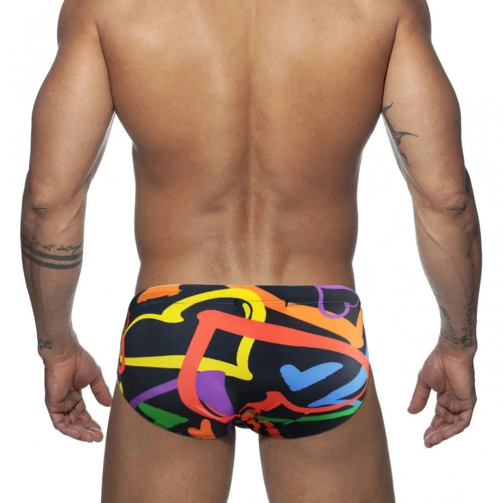 a hot gay man in Men's Heartbeat Swim Briefs - pridevoyageshop.com - gay men’s underwear and swimwear