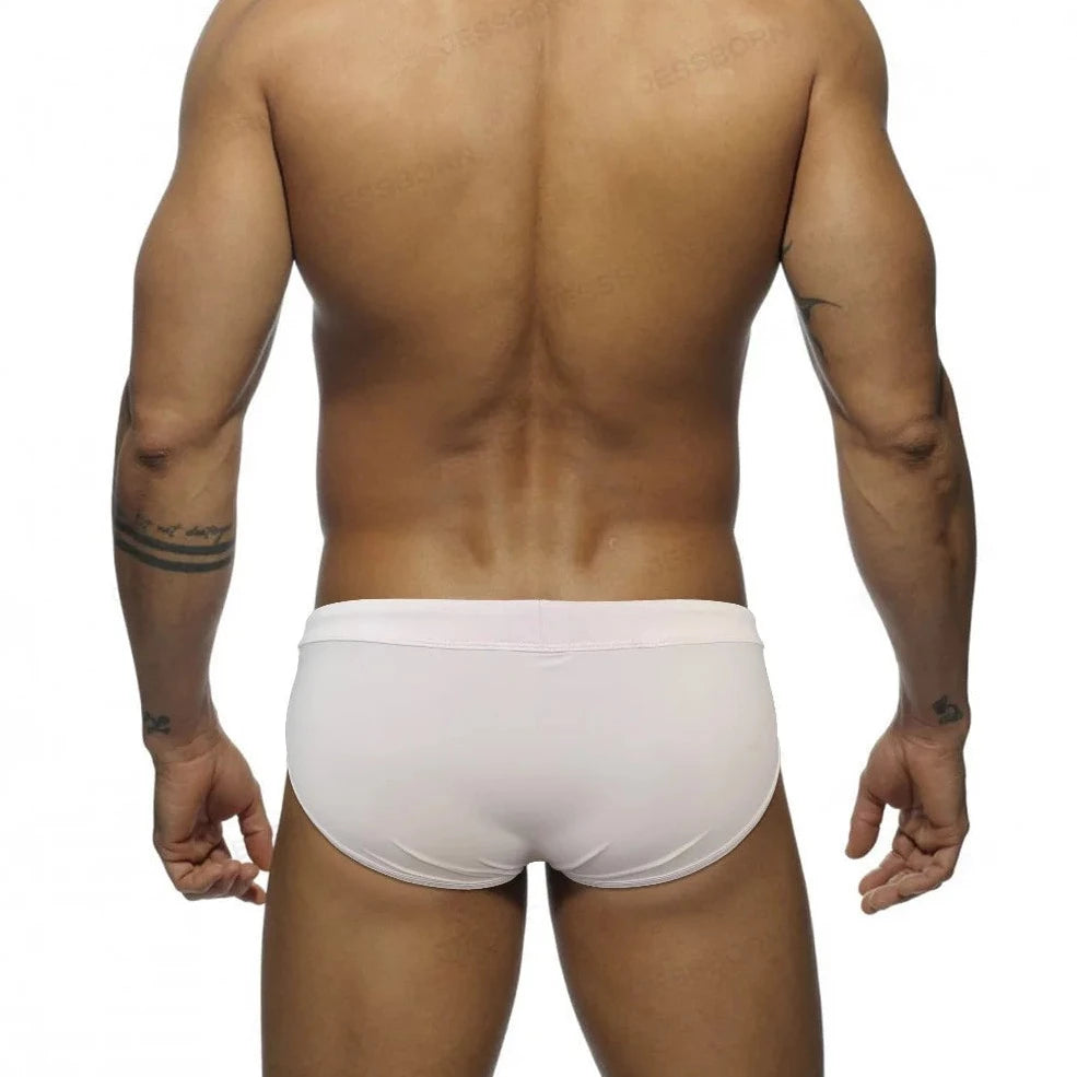 a sexy gay man in white Men's Sideshow Mesh Swim Briefs - pridevoyageshop.com - gay men’s underwear and swimwear