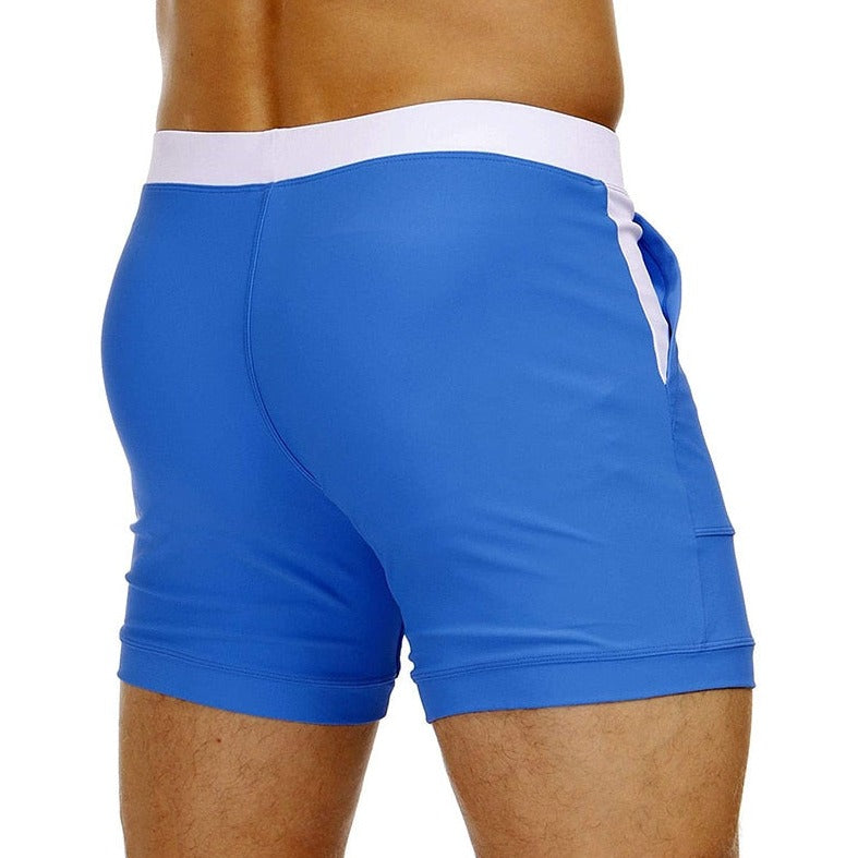 hot gay man in Royal Blue Gay Swimwear & Beachwear | Drawstring Boxer Swim Trunks - pridevoyageshop.com - gay men’s underwear and swimwear
