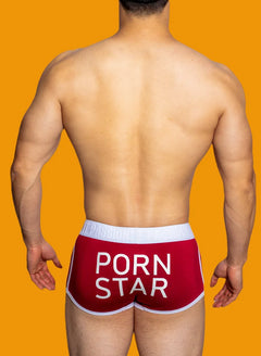 a sexy gay man in burgundy DM Porn Star Pride Boxer Briefs - pridevoyageshop.com - gay men’s underwear and swimwear