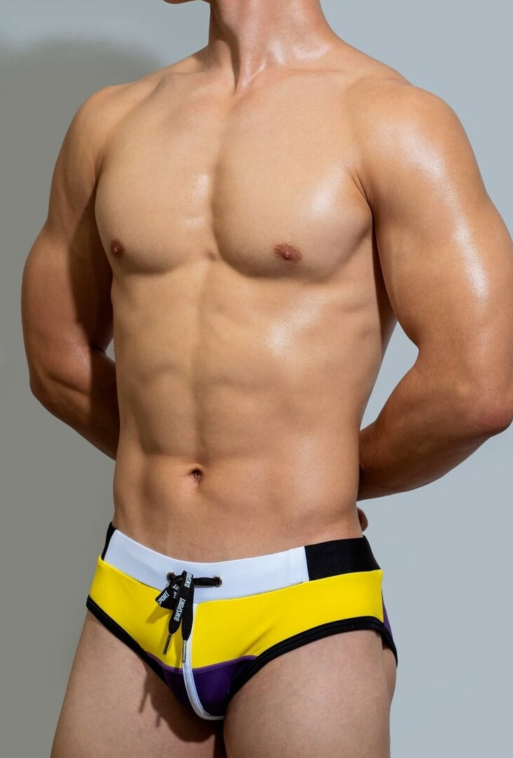 sexy gay man in yellow Gay Swimwear | DM Laced Swim Briefs- pridevoyageshop.com - gay men’s underwear and swimwear