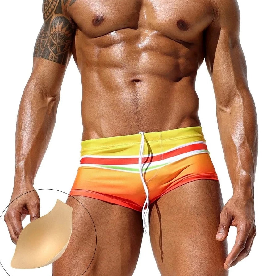 a hot gay man in Men's Sunset Horizon Swim Trunks - pridevoyageshop.com - gay men’s underwear and swimwear