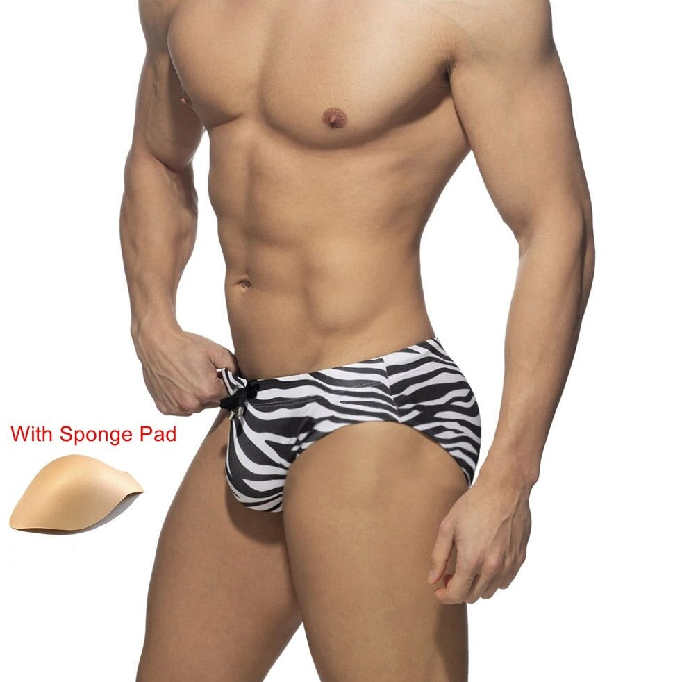 sexy gay man in Gay Swimwear | Zebra Striped Swim Briefs- pridevoyageshop.com - gay men’s underwear and swimwear