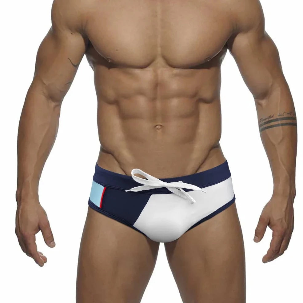 a sexy gay man white Men's Patchwork Bowtie Swim Briefs - pridevoyageshop.com - gay men’s underwear and swimwear