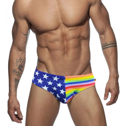 a hot gay man in Men's Patriotic Rainbow Swim Briefs - pridevoyageshop.com - gay men’s underwear and swimwear