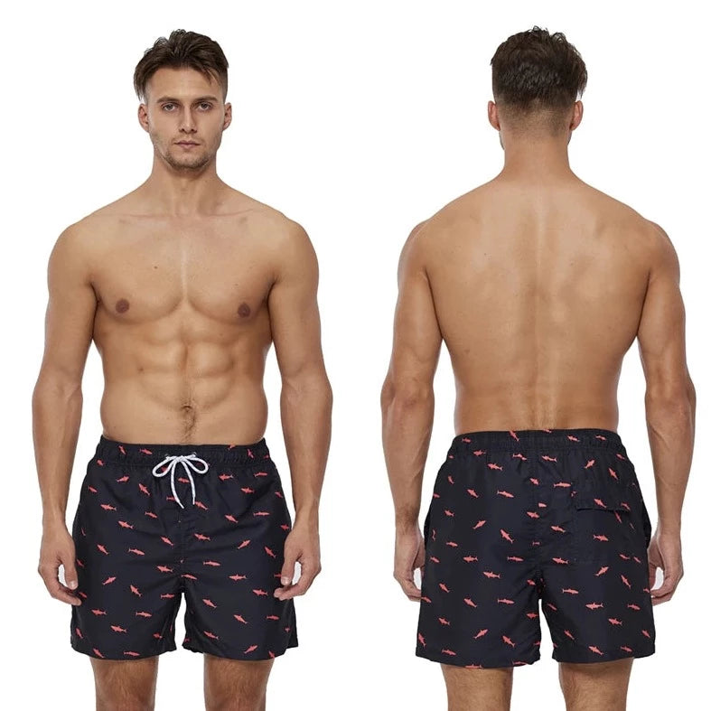 a hot gay man in Red Chili Board Shorts - pridevoyageshop.com - gay men’s underwear and swimwear