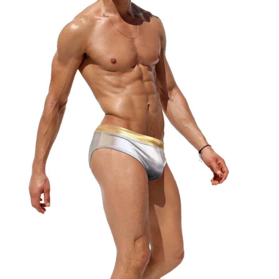 a hot gay man in silver Men's Liquid Metallic Swim Briefs - pridevoyageshop.com - gay men’s underwear and swimwear