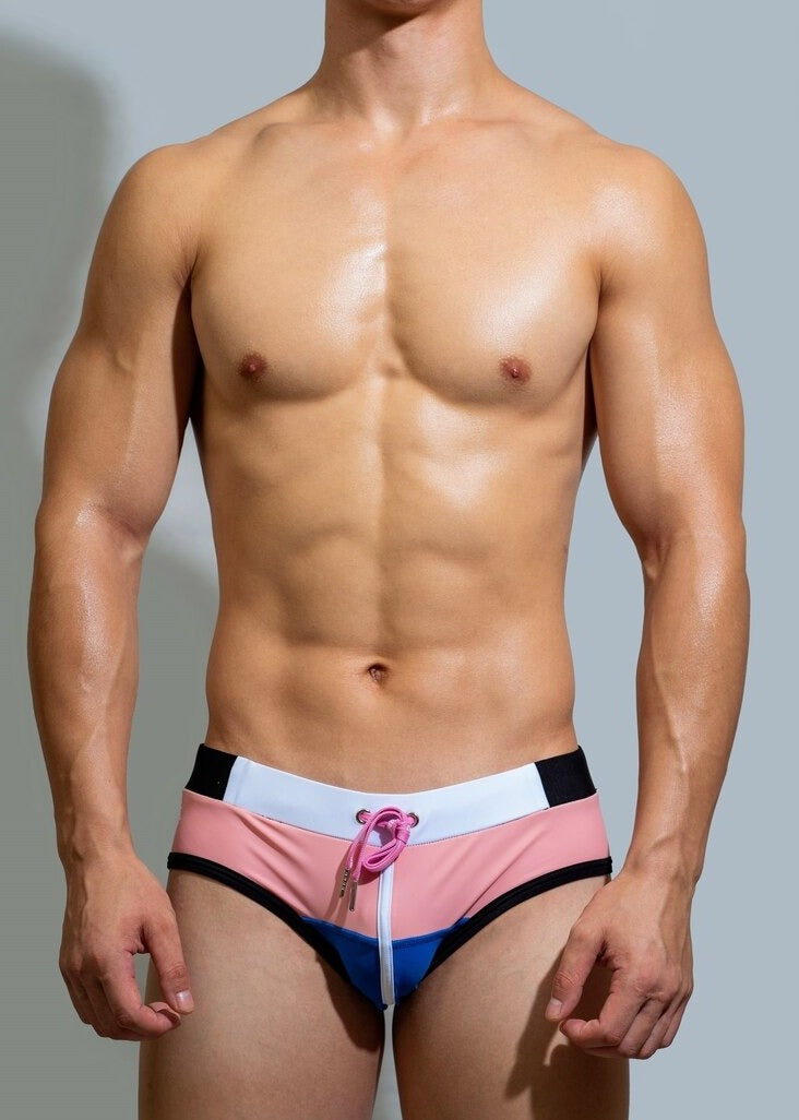 sexy gay man in pink Gay Swimwear | DM Laced Swim Briefs- pridevoyageshop.com - gay men’s underwear and swimwear